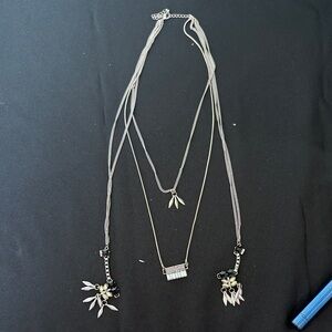 Elegant Silver Necklace with Black and White Accents